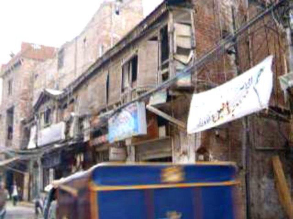 HD - Lahore near old city showing auto rickshaw